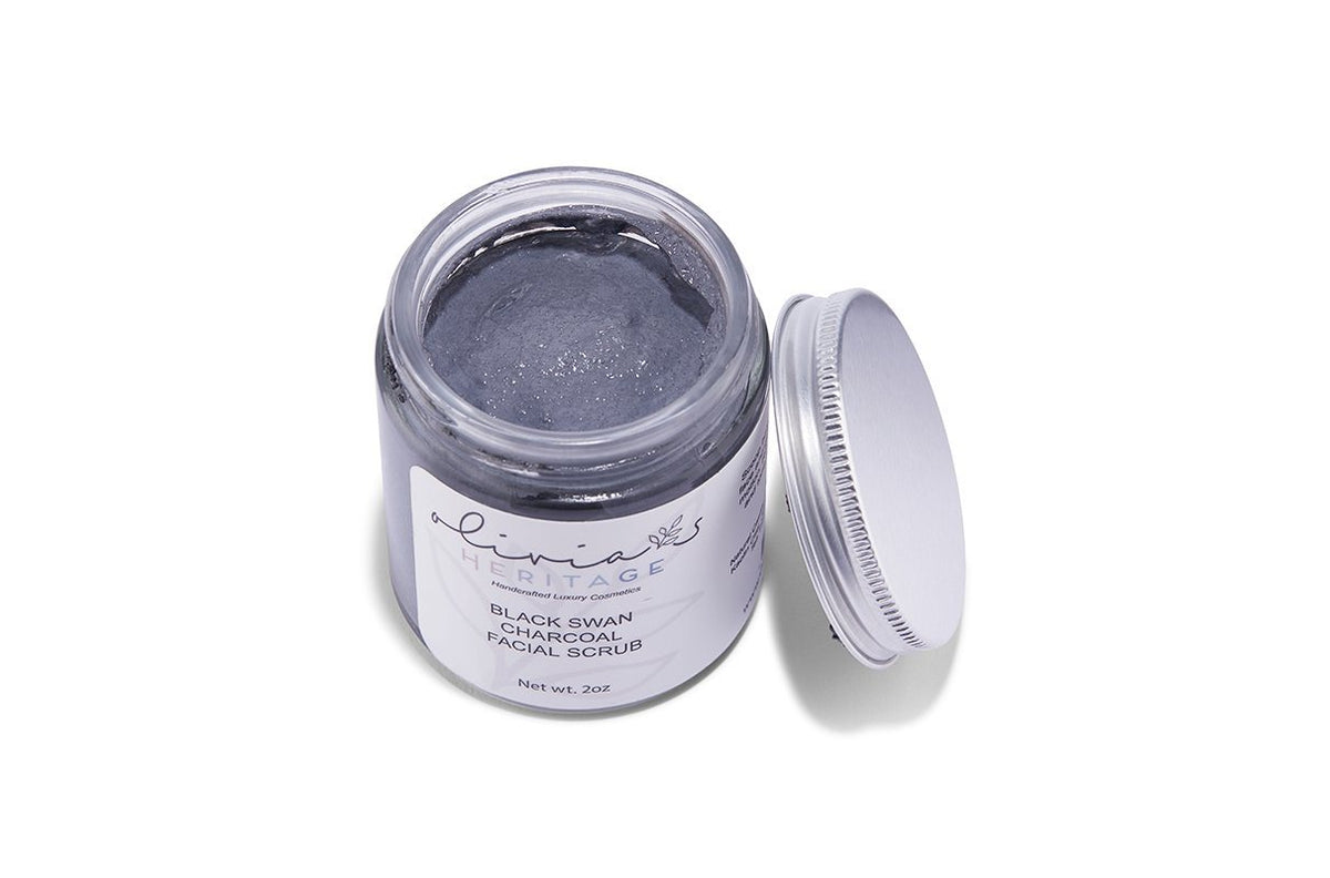 Black Swan Scrub, a luxurious face scrub that gently exfoliates and revitalizes, leaving skin smooth and refreshed, available at uliviasheritage.com